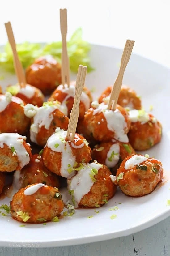 Buffalo Chicken Meatballs on a plate with toothpicks