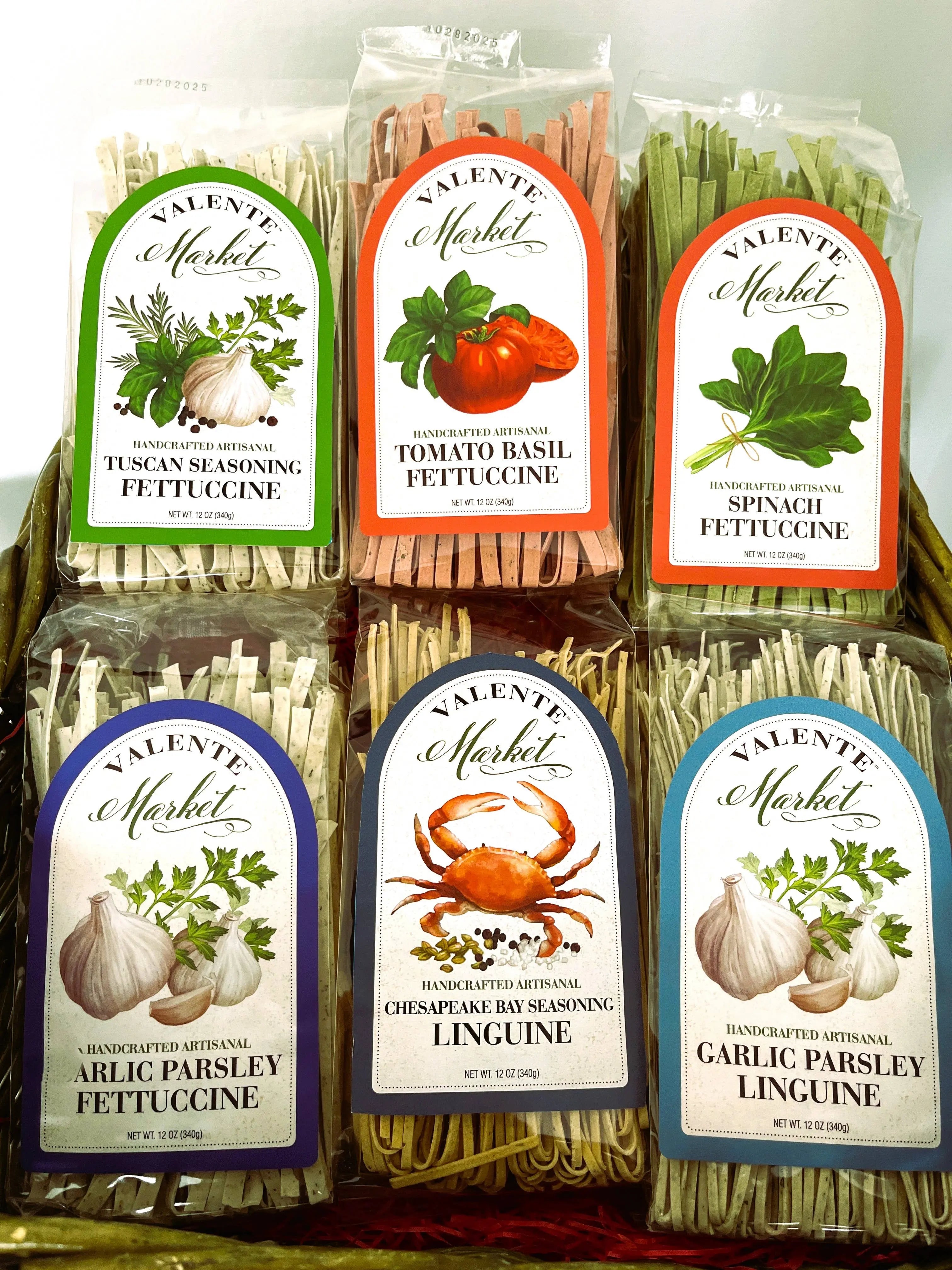 Assorted packs of gourmet fettuccine and linguine pasta in various flavors