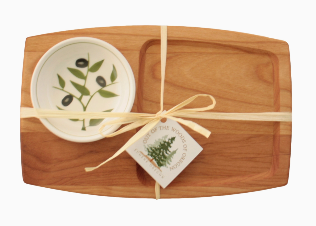 Wood appetizer board with olive branch bowl