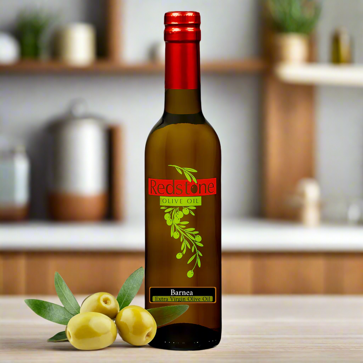 bottle of Barnea Extra Virgin Olive Oil with fresh olives
