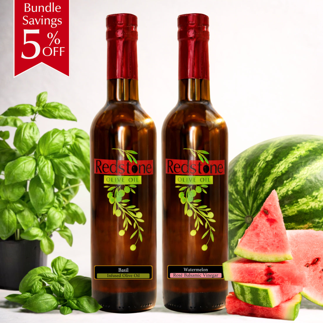 Redstone Olive Oil basil-infused olive oil paired with watermelon rosé balsamic vinegar, displayed with fresh basil and sliced watermelon
