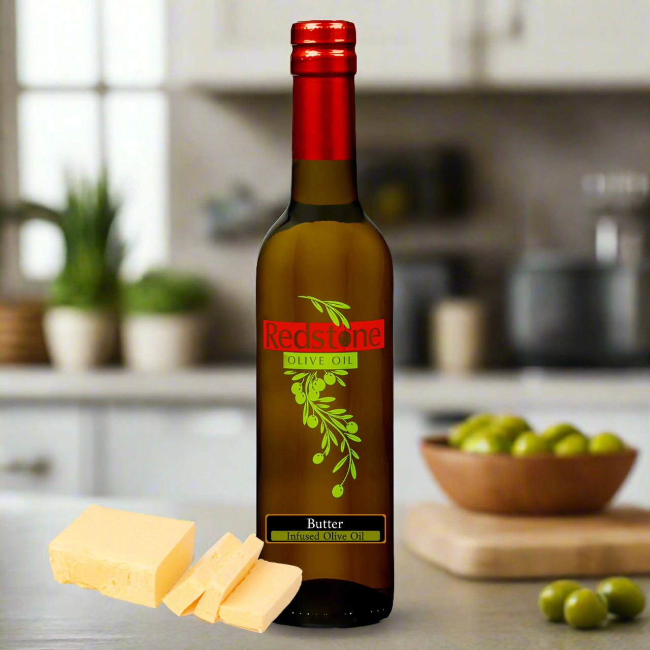 A single bottle of butter-infused olive oil next to a wedge of artisan cheese