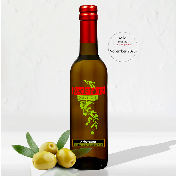 Bottle of California Arbosana Extra Virgin Olive Oil (EVOO), featuring premium cold-pressed olive oil made from Arbosana olives, with clean, modern packaging and a rich golden-green oil visible through the bottle.