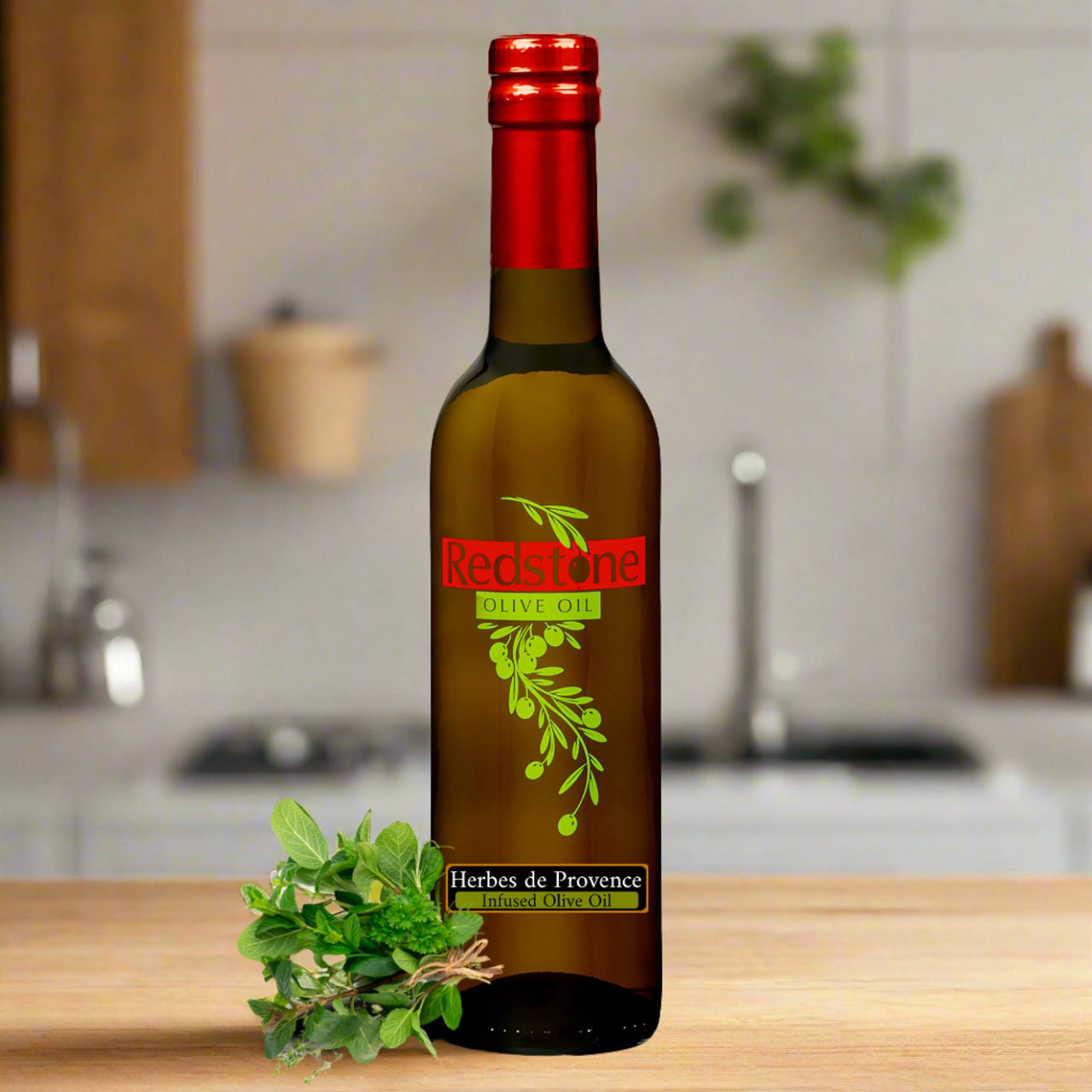 Olive oil bottle infused with a sprig of Herbes de Provence