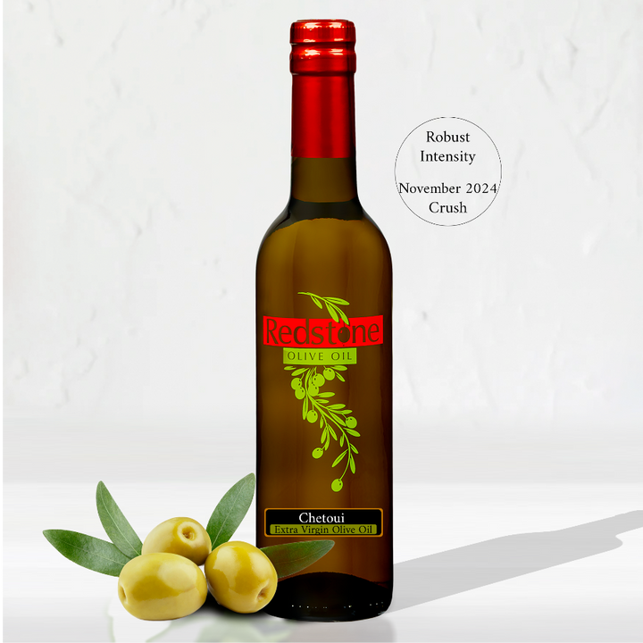 Tunisia Chetoui Extra Virgin Olive Oil bottle with fresh olives
