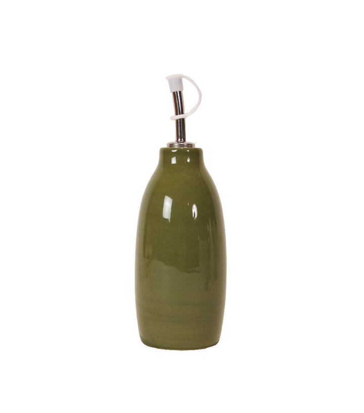 Olive green ceramic oil and vinegar cruet with pour spout on white background