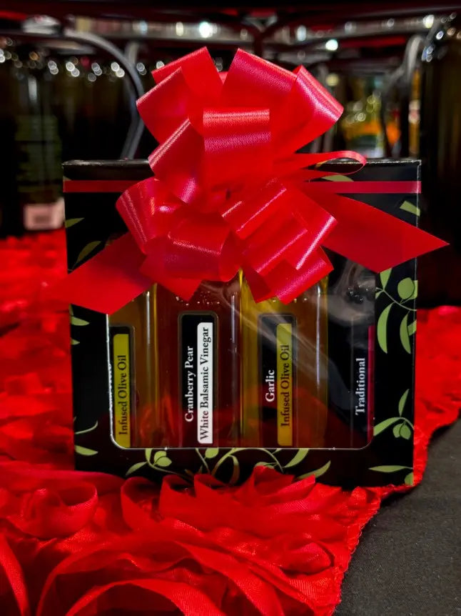 Olive oil and balsamic vinegar sampler gift set with red ribbon and floral box
