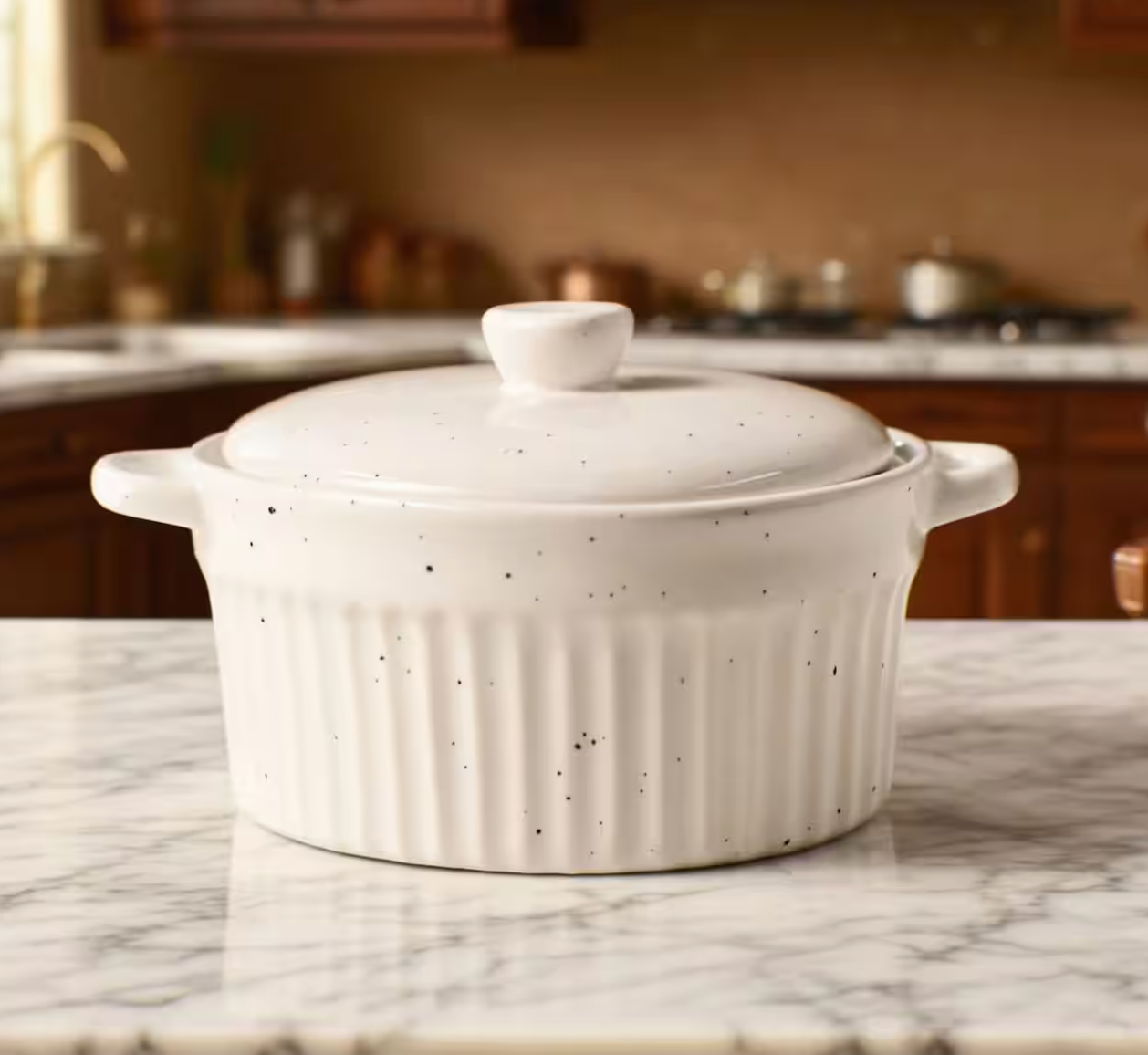 Ramkin with lid on granite counter top in kitchen