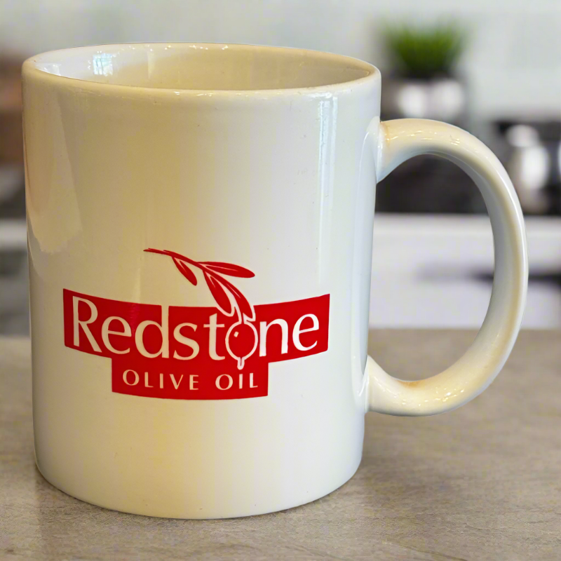 White Coffee Mug with Redstone Logo on kitchen counter top