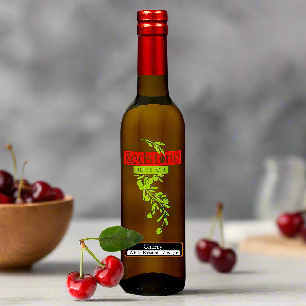 Cherry Balsamic Vinegar bottle in kitchen on counter with cherries