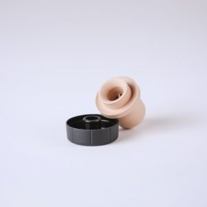 Top and Bottom pieces of a balsamic rubber pour spout