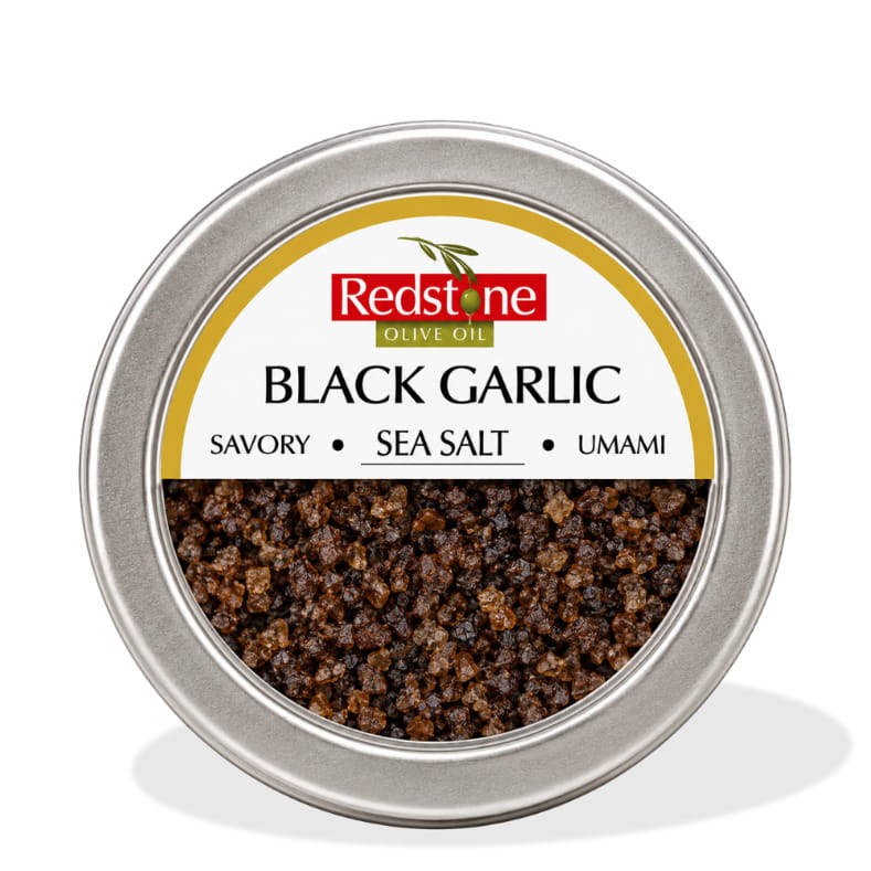 Redstone Black Garlic Sea Salt front tin label — Savory · Sea Salt · Umami — all natural, no preservatives