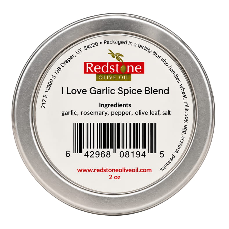 Redstone I Love Garlic Spice Blend back label showing barcode, ingredients: garlic, rosemary, pepper, olive leaf, salt — 2 oz tin