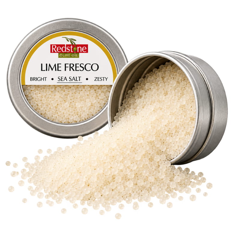 Redstone Lime Fresco Sea Salt open tin spilling bright citrus sea salt crystals — all-natural gourmet finishing salt