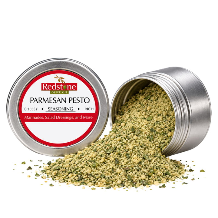Redstone Parmesan Pesto Spice Blend open tin spilling herby cheesy seasoning blend — basil, parsley, garlic, parmesan