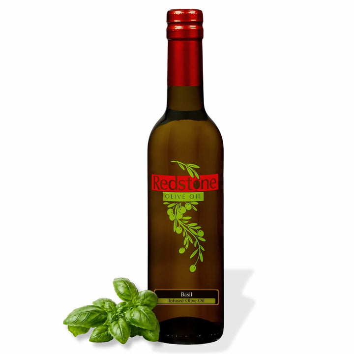Redstone Basil Infused Olive Oil bottle with fresh basil garnish on white background