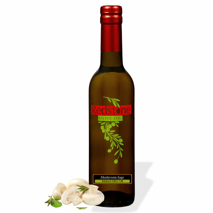 Bottle of Redstone Mushroom Sage Infused Olive Oil with fresh mushrooms and sage