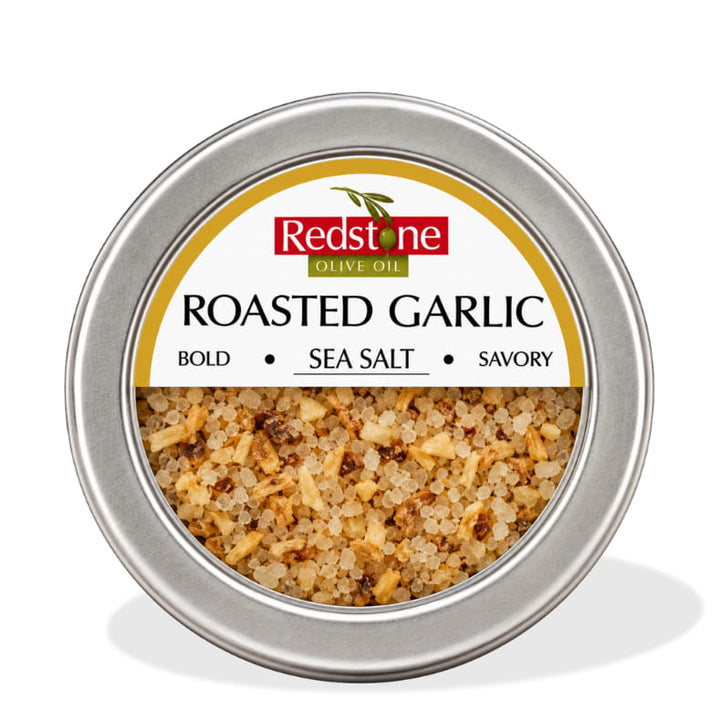 Redstone Roasted Garlic Sea Salt front tin label — Bold · Sea Salt · Savory — all natural, no preservatives