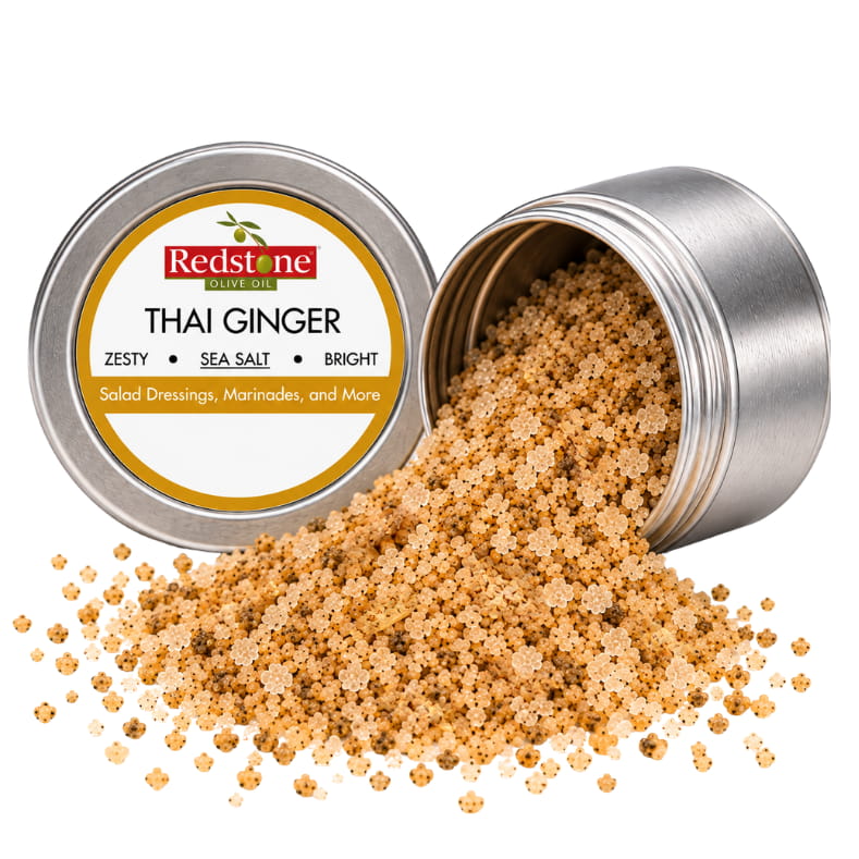 Redstone Thai Ginger Sea Salt open tin spilling zesty golden ginger sea salt crystals — all-natural gourmet finishing salt