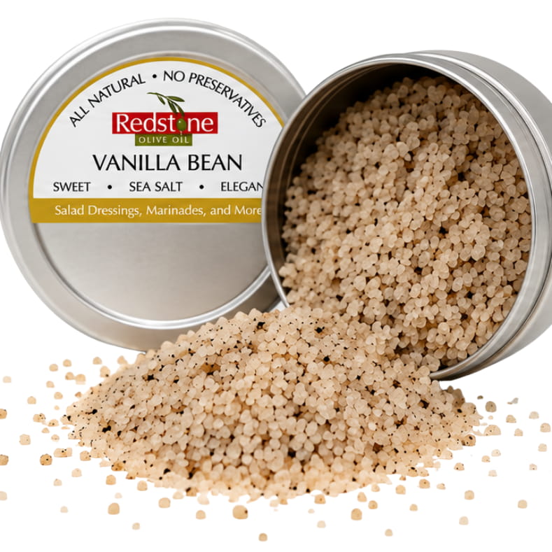 Redstone Vanilla Bean Sea Salt open tin spilling pearl-white vanilla-flecked crystals — all-natural gourmet finishing salt