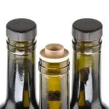 Tapi Pour Spout — resealable rubber pour spout fitted into an olive oil or balsamic vinegar bottle