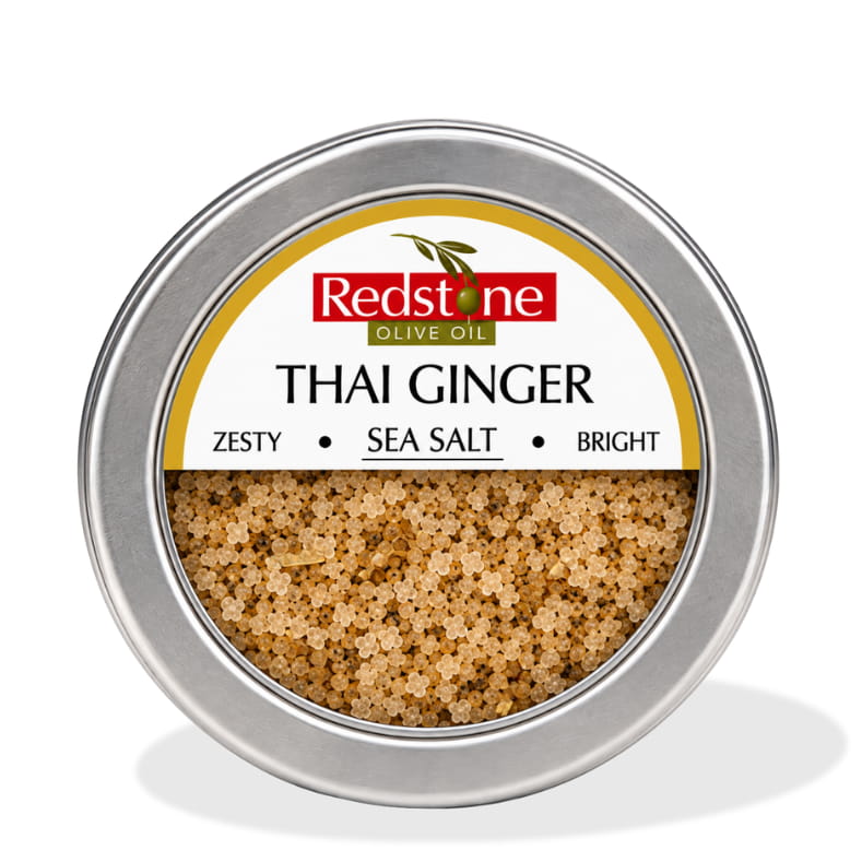 Redstone Thai Ginger Sea Salt front tin label — Zesty · Sea Salt · Bright — all natural, no preservatives